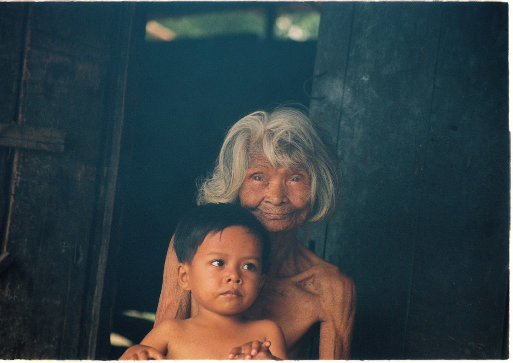 Old woman with a child in Phan Rang, 7/2014